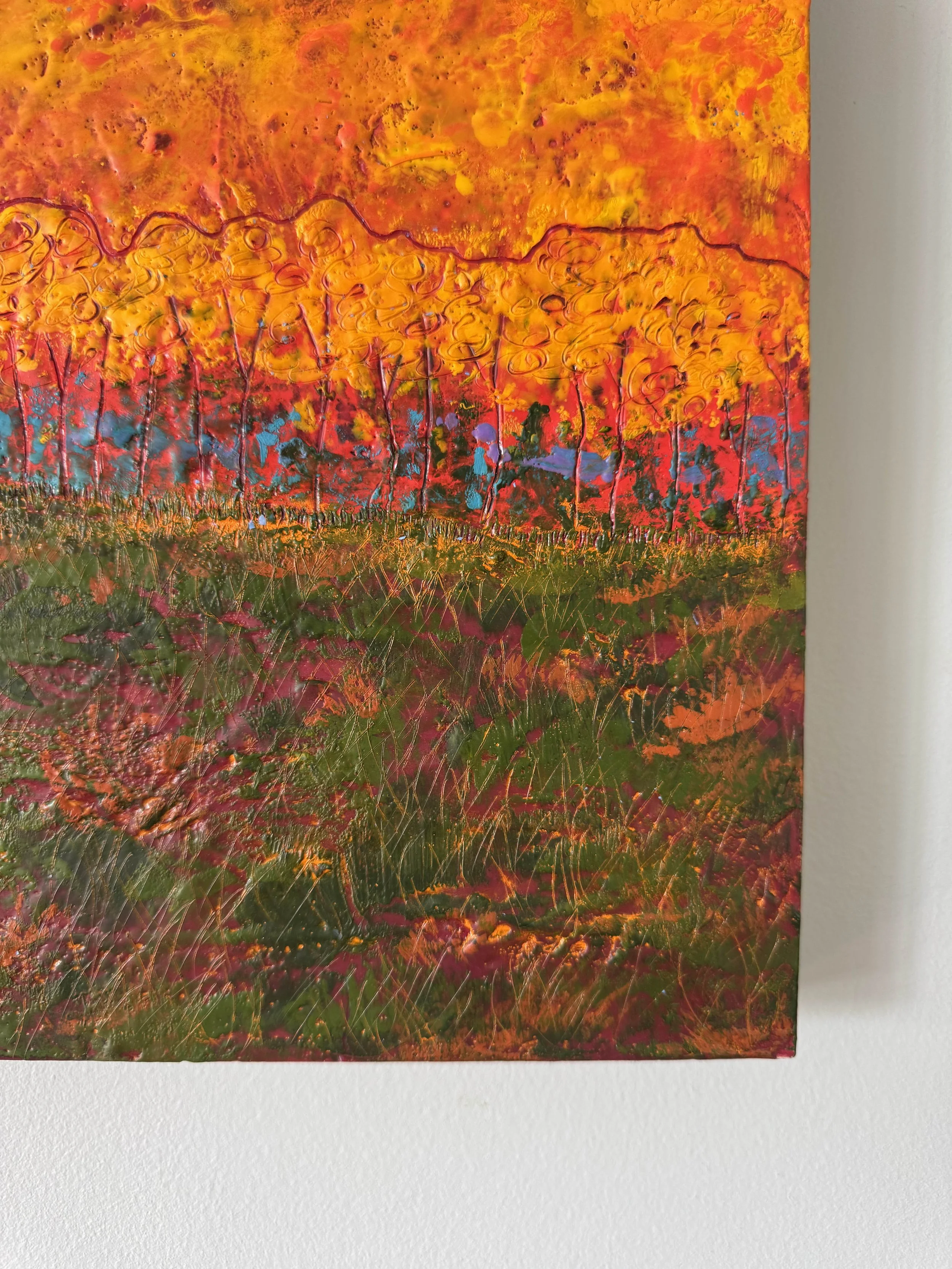 encaustic painting of peak foliage season in Vermont with brightly